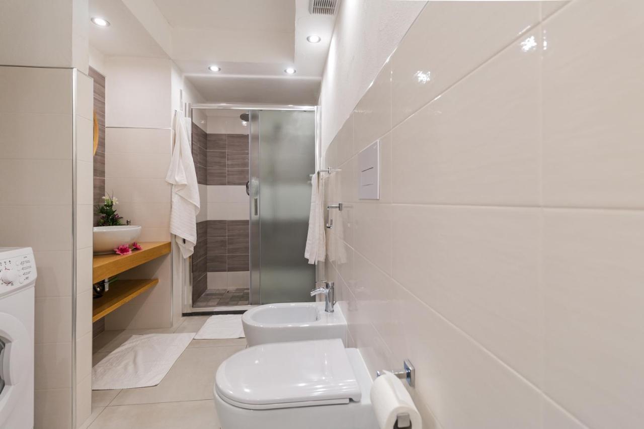 Purple Flower Suite Apartment Cala Gonone Ngoại thất bức ảnh